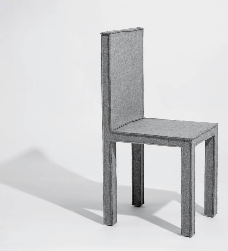 The Felt chair is a piece in the Felt series designed by Reed and Delphine Krakoff for Established and Sons. The chair features an archetypal furniture form reinvented in soft felt with beautiful stitch detailing. The Felt series was on display at