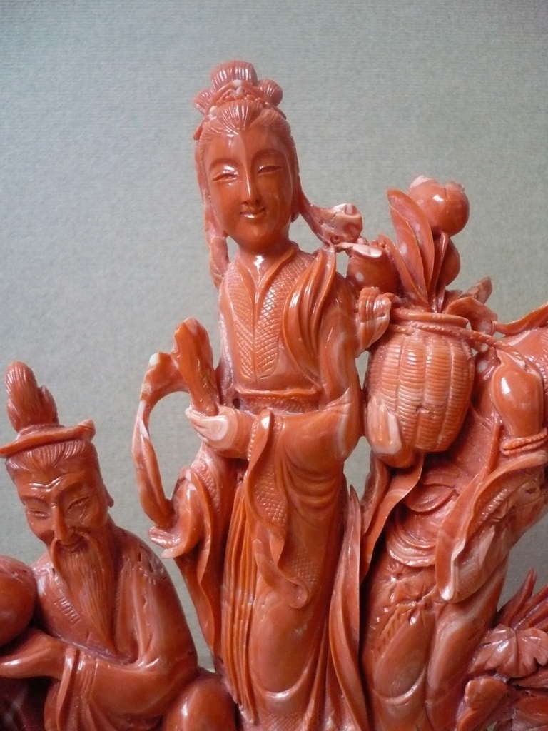 Great Carved figure representing a chinese scene.. 2 women... one holding some flowers... and a old chinese men... holding a bag... and in the other hand a paper...
Very detailed... high quality manufacture...
 
In general Coral Sculpture is in