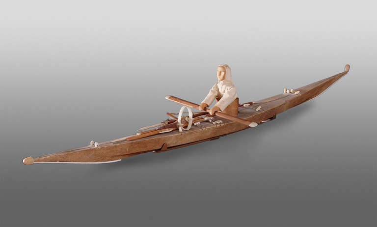This miniature kayak includes a traditionally dressed Eskimo with complete implements.

The Inuit territory includes northern Canada and parts of Alaska.

Custom display stand is included.

Expedited shipping is available; please contact us