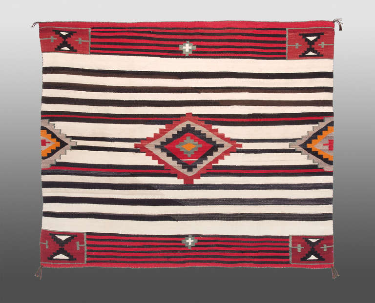 A Chiefs Blanket in a variant of a Third Phase pattern (also referred to as a Fourth Phase.) 

Complimentary Shipping within the United States. Contact us for a quote on international shipping. Same Day Shipping and expedited services