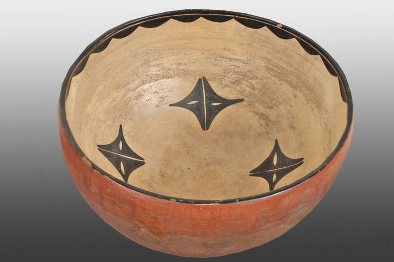 Antique circa 1875-1900 historic pueblo pottery bowl, Southwestern Native American Indian dough bowl built by hand and painted with red/orange, black and tan slip glazes in a Traditional Design by a 19th century potter at Tesuque Pueblo in Santa Fe