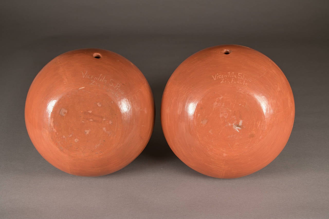 A pair of earthenware lamps finely painted in polychrome with slip glazes in a classic Zia motif.

Zia Pueblo is located 18 miles northwest of Bernalillo, New Mexico.
