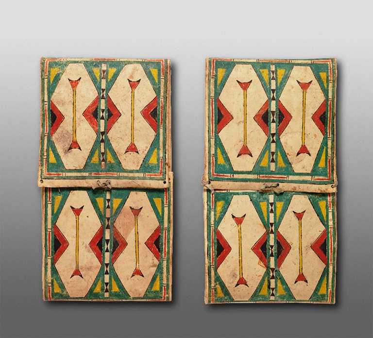 This pair of Native American/North American Indian matching painted parfleche envelopes were created by a member of the Cheyenne tribe most likely around 1885. It is extremely rare to find a 19th century matching pair such as this.

Parfleches are