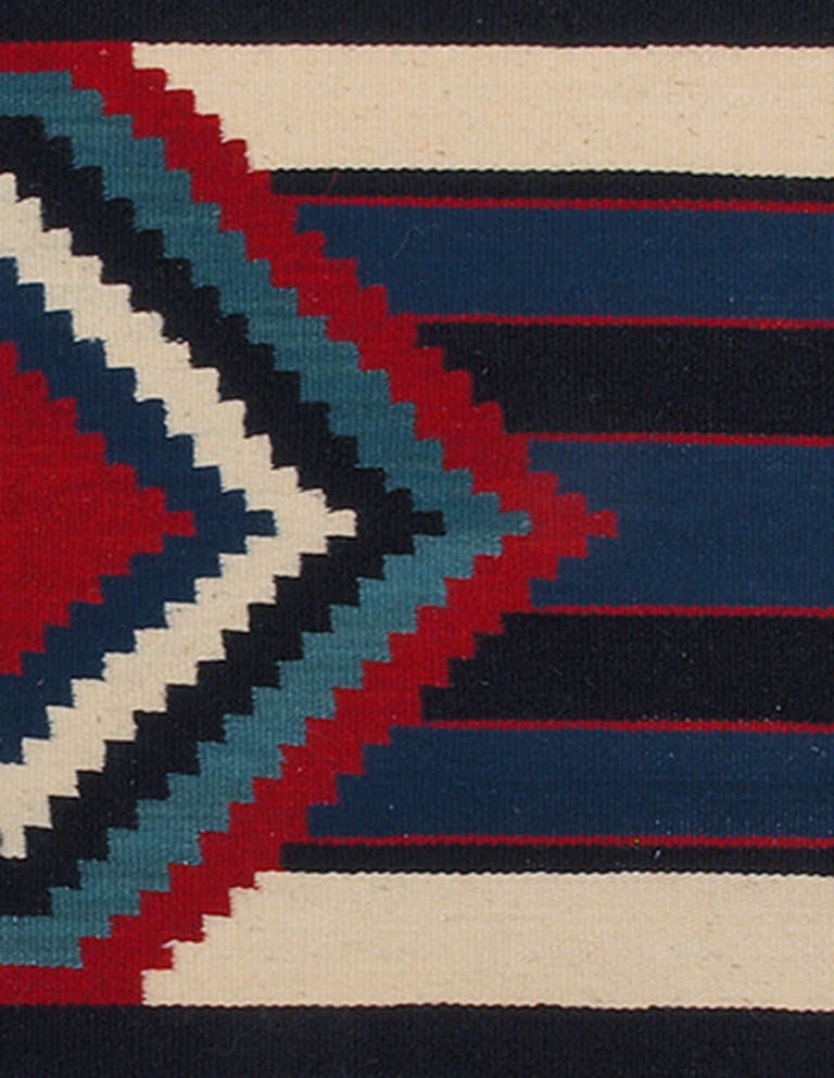 A contemporary Chiefs blanket.  Finely woven of Churro wool with natural and synthetic dye by an expert Navajo weaver living in the Four Corners Region of the American Southwest.  

Please contact us for additional sizes, styles and colors.