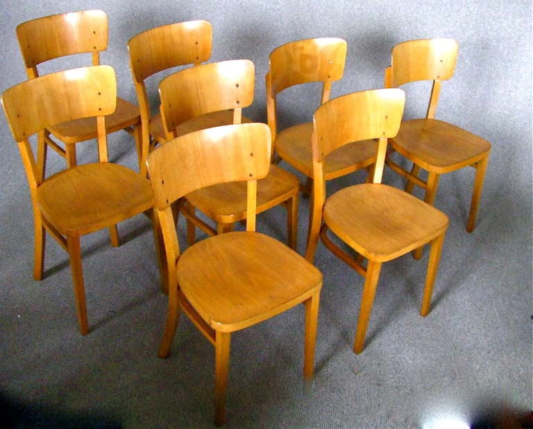 Set of 8 German Midcentury Bistro Chairs 1950 signed Thonet

A Set of 8 chairs, original work from the known german manufacturer Thonet. Beech wood. The chairs are in good vintage condition, unrestored.  Signed underneath. 

Height   82 cm (