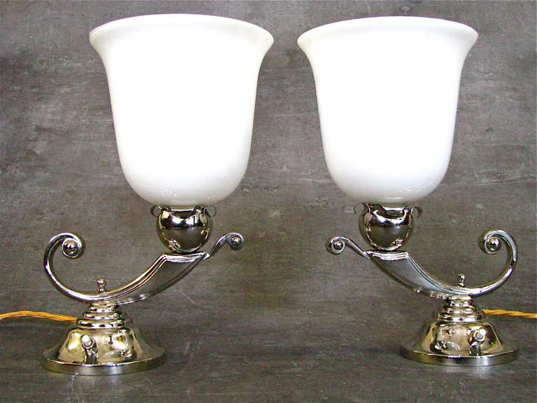 A pair of Art Deco table lamps, Mazda, 1930. Original French Art Deco table lamps from Mazda Manufacture. Full restored condition, rewired, new nickel-plated, silk cable.

Measures: Height 28 cm ( 11 in)
Length 20 cm ( 7.9 in )
Width 16 cm ( 6.3