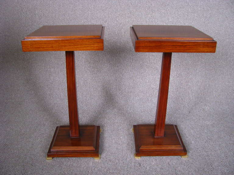 Pair of rosewood Art Deco side tables.<br />
<br />
Description<br />
French Art Deco side tables, France, circa 1930. Rosewood veneers, feet with gold leaf. Restored with French polish.<br />
<br />
Width  32	cm 	( 12,6 in)<br />
Length  32	cm 	(
