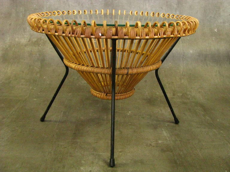 Midcentury Rattan Coffee table by Janine Abraham, 1950

French Rattan table with center glass and metal base in perfect vintage condition.

Width: 27.2  in ( 69 cm)
 
 Height: 20.1 in ( 51 cm)

 Note: Eye catcher with fantastic line