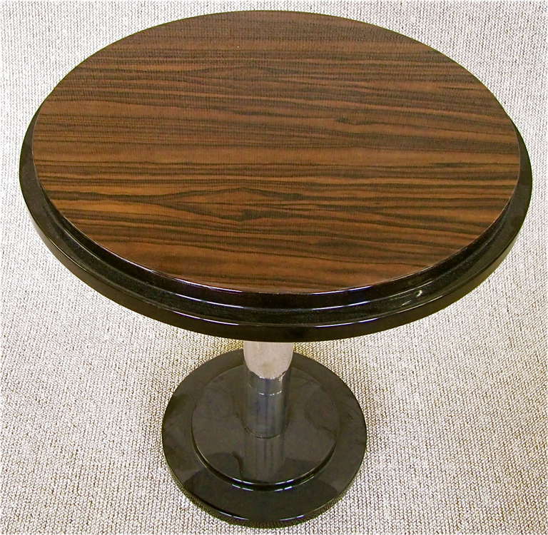 Art Deco Side Table, France around 1930, exotic Macassar wood. Full restored Condition, high Gloss Lacquer with Nickel plated foot.

Note:  Beautiful material mix!

Width  55 	cm 	( 21,7 in)
Length  	cm 	(  in)
Height	 64	cm	(  25,2 in)

***