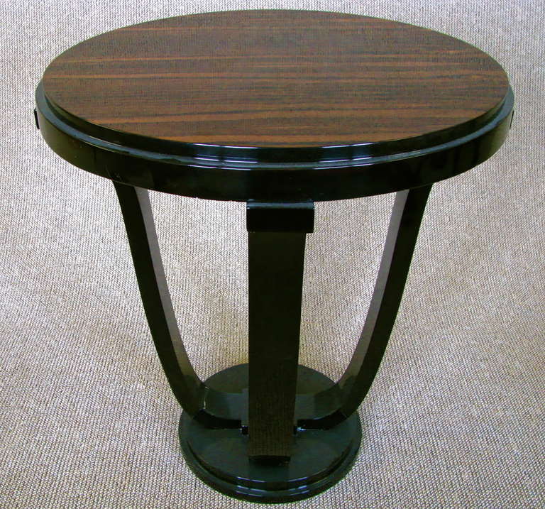 Art Deco Side Table, France around 1930, exotic Macassar wood. Full restored Condition, high Gloss Lacquer black and clear.<br />
<br />
Note:  Leg Details!<br />
<br />
Width 60 	cm 	( 23,7 in)<br />
Length  	cm 	(  in)<br />
Height	 66	cm	(  26