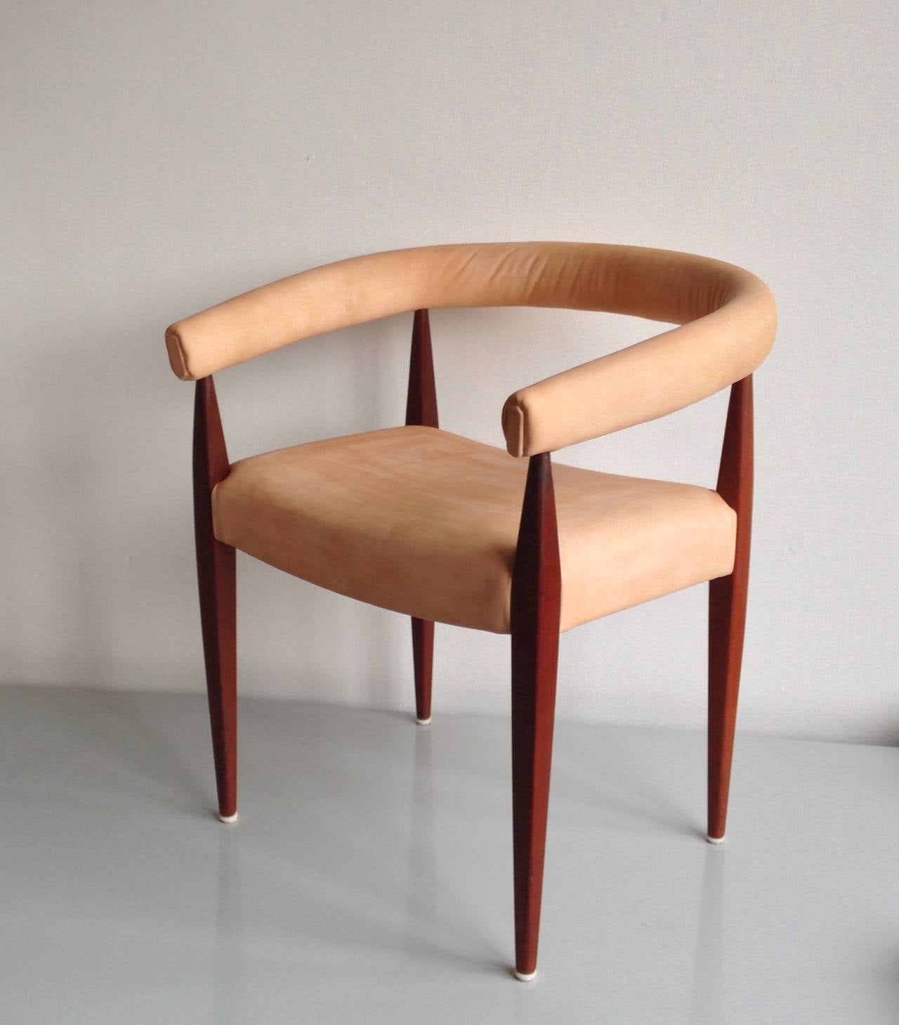 Nanna Ditzel (1923 - 2005)

Solid Teak Armchair No. 114? - Poul Kolds Savvaerk, Denmark. Designed in 1955. Comparable Model as 113 but with Leather Armrest or with model FM 2611 the later produced 