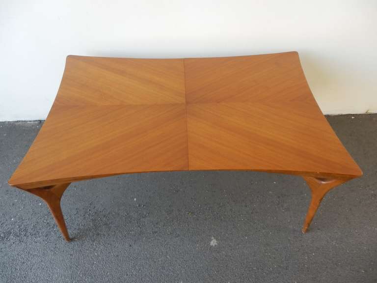 designed around 1952 and made by grosfeld house. 39,3 inches wide  / 62,5 inches long and can be extended 3x 20 inches/ each. so the table is 122,5 inches long .
