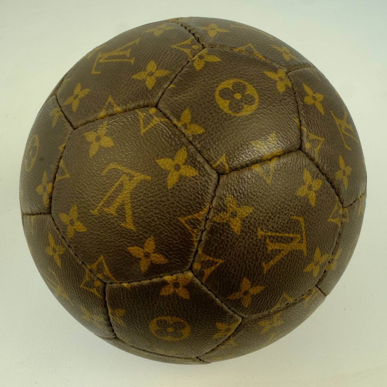 Louis Vuitton soccer ball made for the World cup in France in 1998 in a limited edition about 3000 pieces, as present for artists, celebrities and politicians. Great collectible or decorative item. The ball comes with a dustbag and a Photography