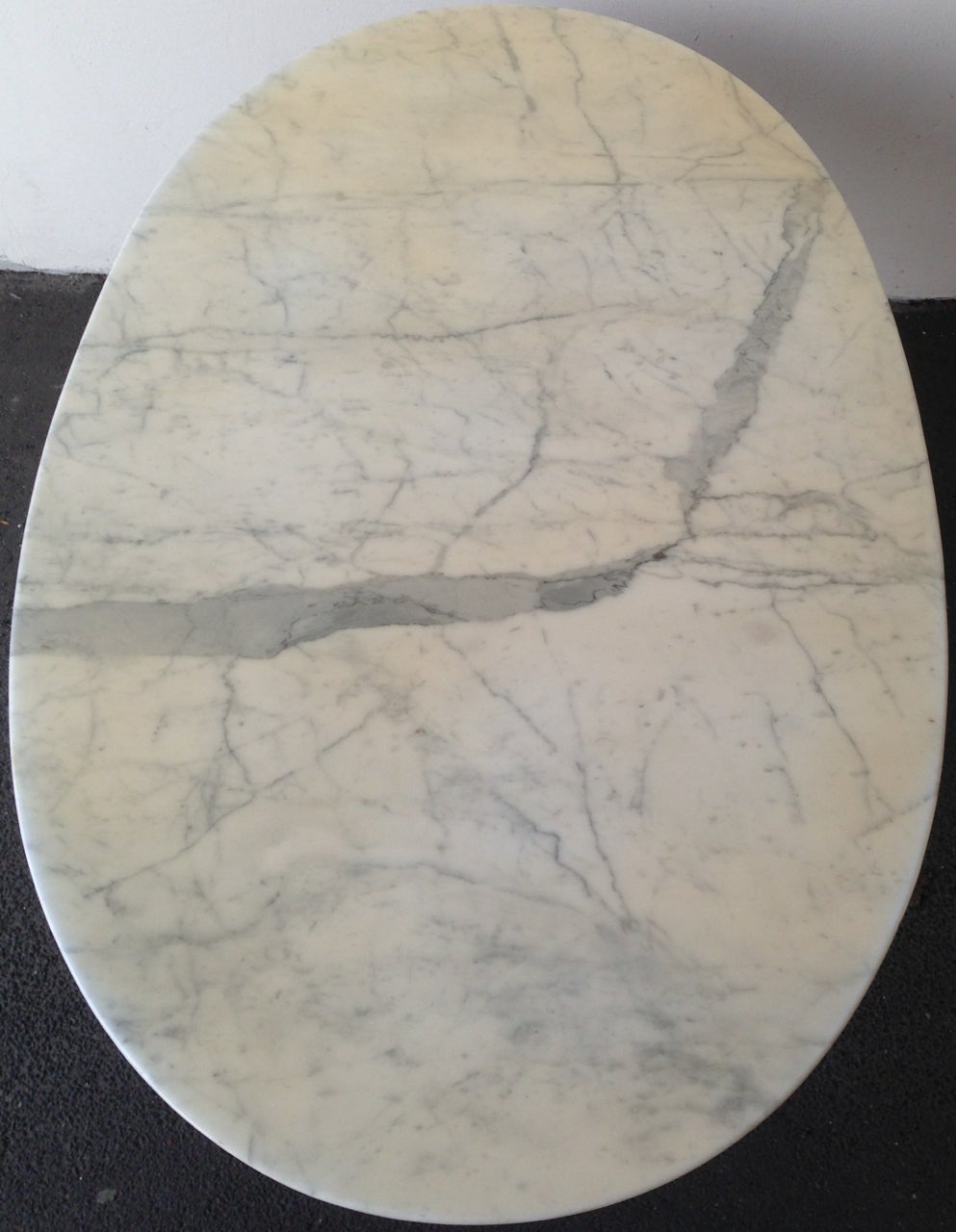 cast metal base and oval marble base. amazing design.