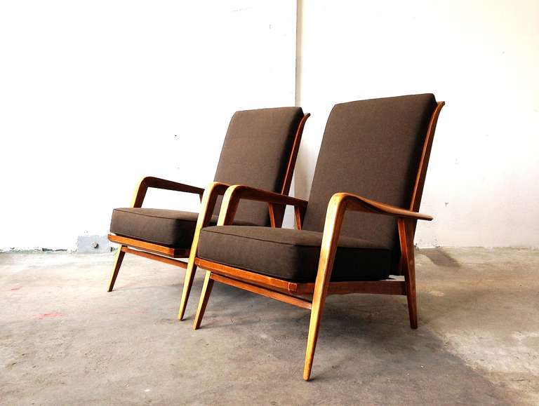 Etienne-Henri Martin (1905 - 1998 )

Pair of new upholstered armchairs with massiv wood frame by Etienne-Henri Martin. It´s a very elegant and comfortable easy Chair with a adjustable Back.
Modell SK 140 designed 1937 for and with Charles