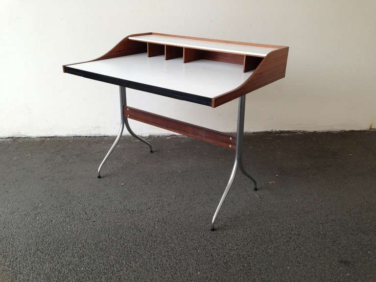 rare and early george nelson swag legged desk . it´s the early version and the hard to find rosewood version. very good and all original condition