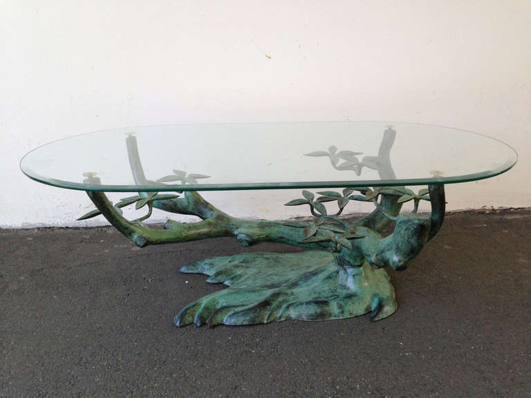 nice and sculptural coffee table by willy daro in very good condition . purchased from the original owner.