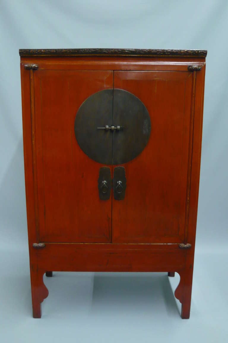 19th century red lacquer Chinese wedding cabinet.