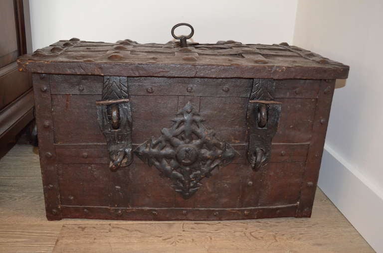Dutch Wrought Iron Strong Box with engraved coverplate with tulips and mermaids. The sides with carrying handels.
Original finish with wear and age.