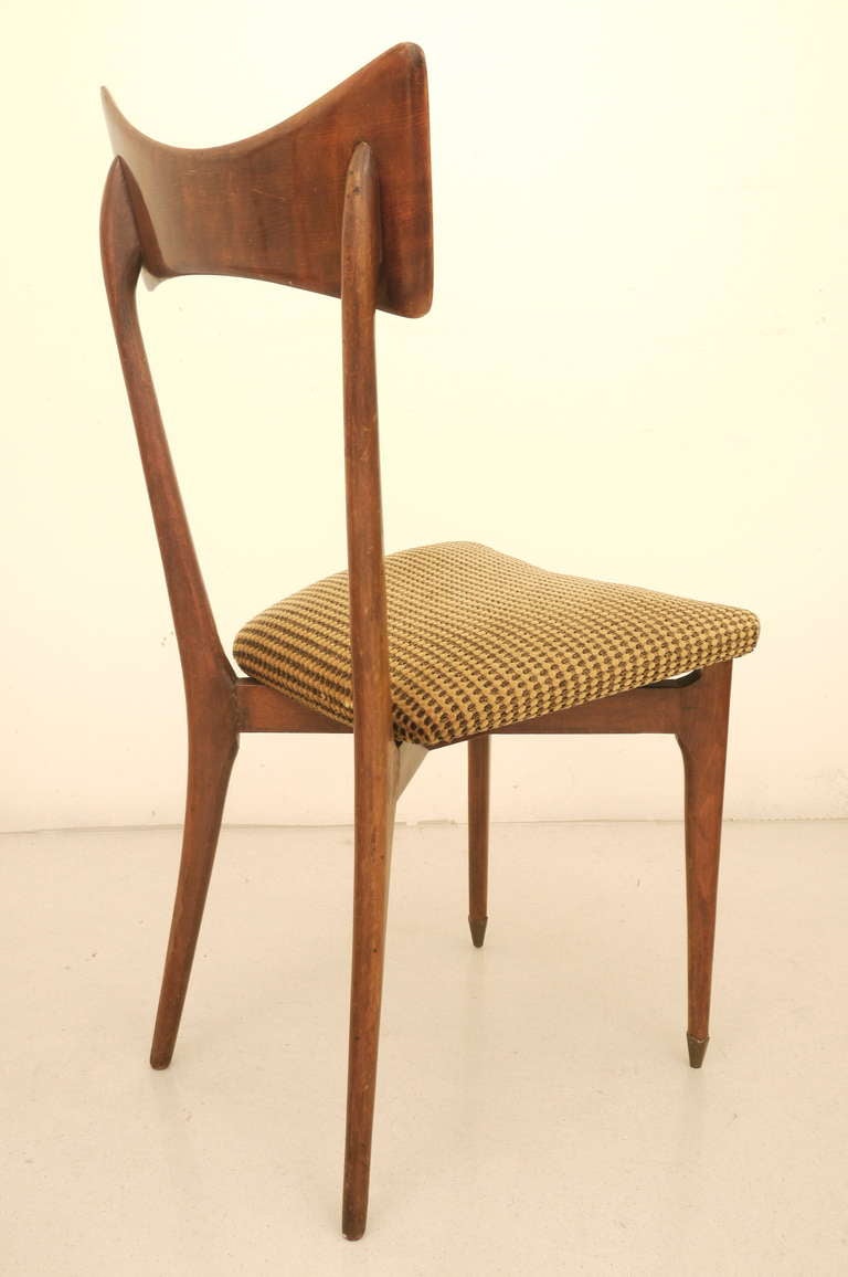 A pair of Ico and Luisa  Parisi dining chairs . Mahogany framework  ,together with brass 