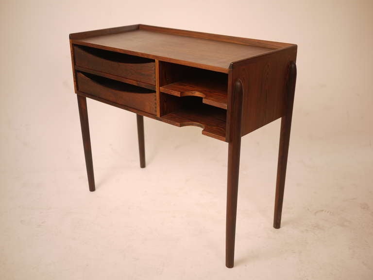 A 1950s  rosewood side telephone table designed by Arne Vodder . Cite's export certificate.
