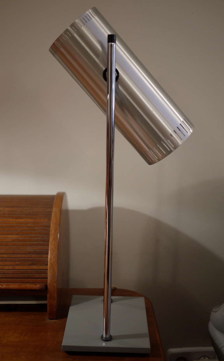 A 1960 table lamp designed by Jo Hammelborg .Frame of enameled metal and aluminum.Excellent condition.Free shipping.