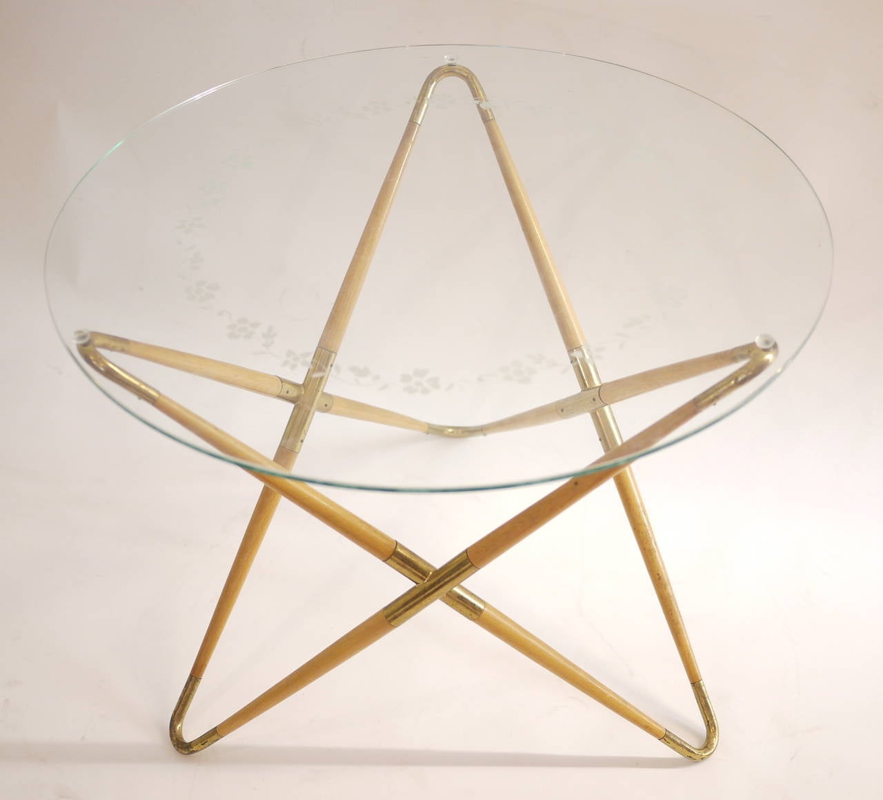 A 1950 Cesare Lacca coffee table . Glass , brass and cherry wood.Excellent condition.