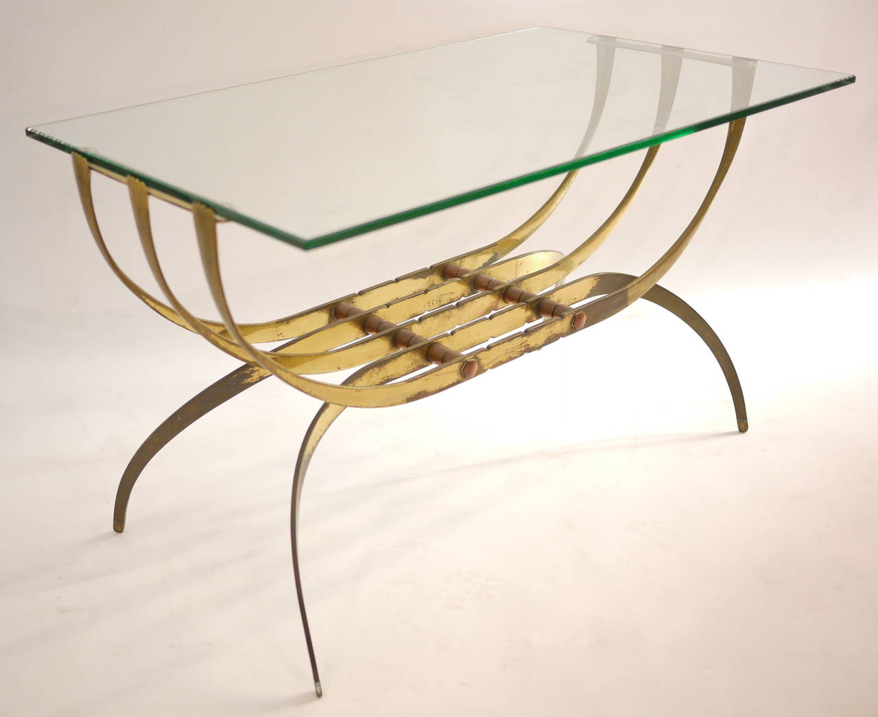 A 1940 coffe table . Brass and cystal-cut glass.
