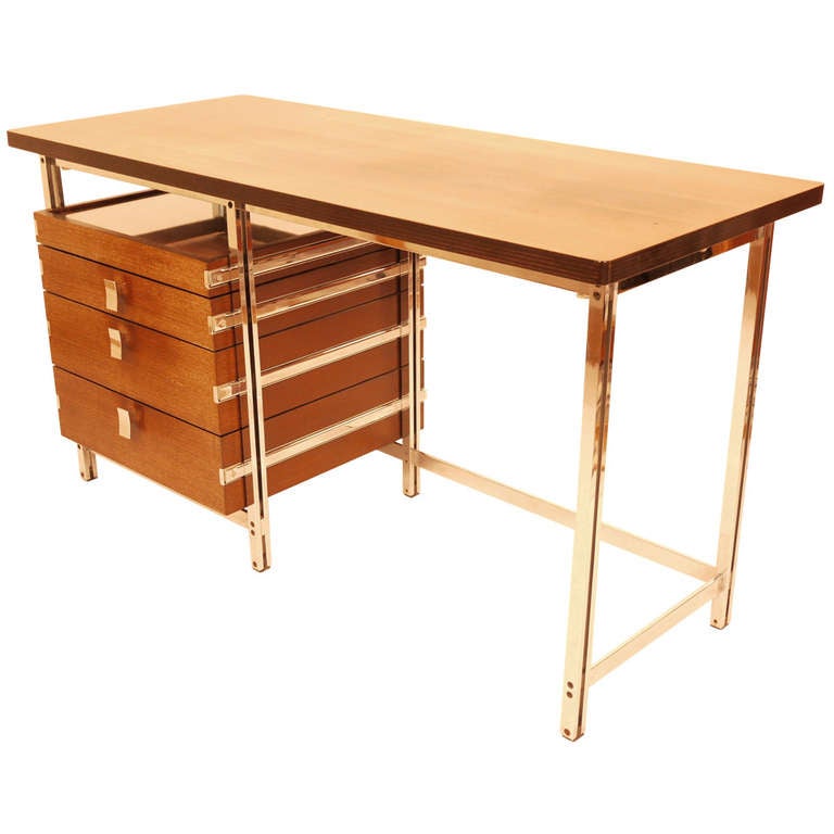 A Jules Wabbes rosewood writing table .Edited by Mobilier Universel ( Belgium) , circa 1960 . Massif chrome-plated steel frame.All handles marked "Wabbes".