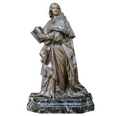 Brass Bishop Statue on Marble Plateau