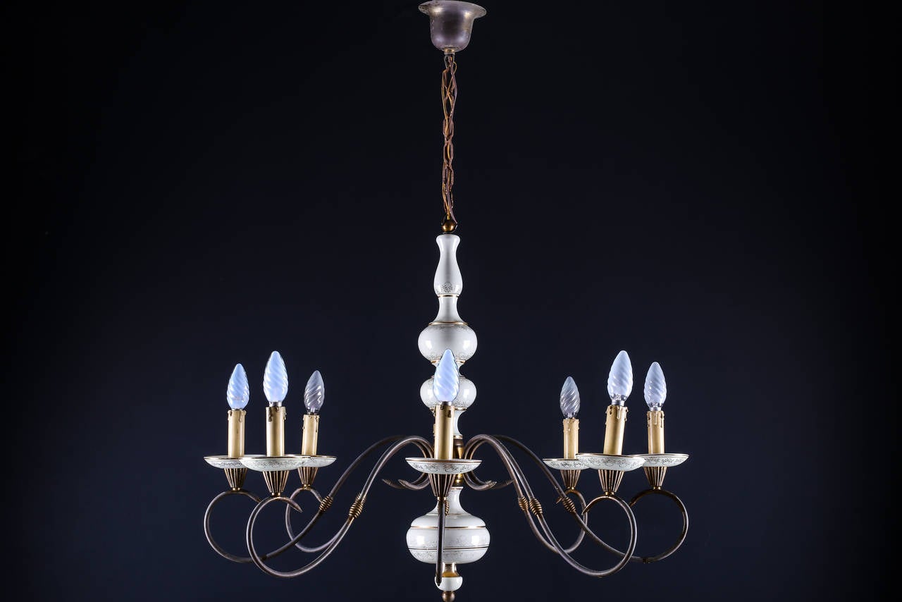Beautiful Brass & Porcelain Eight Light Aesthetic Movement Chandelier

Total Height: 38” – 96.5 cm
Total Width: 30