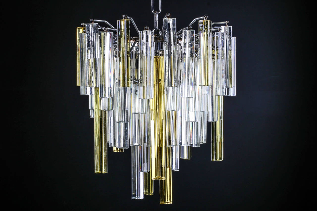 Vintage Italian chandelier with amber tint and clear Murano glass by Venini

Option: Total height can be shortened if necessary.
Measure: Total height 39