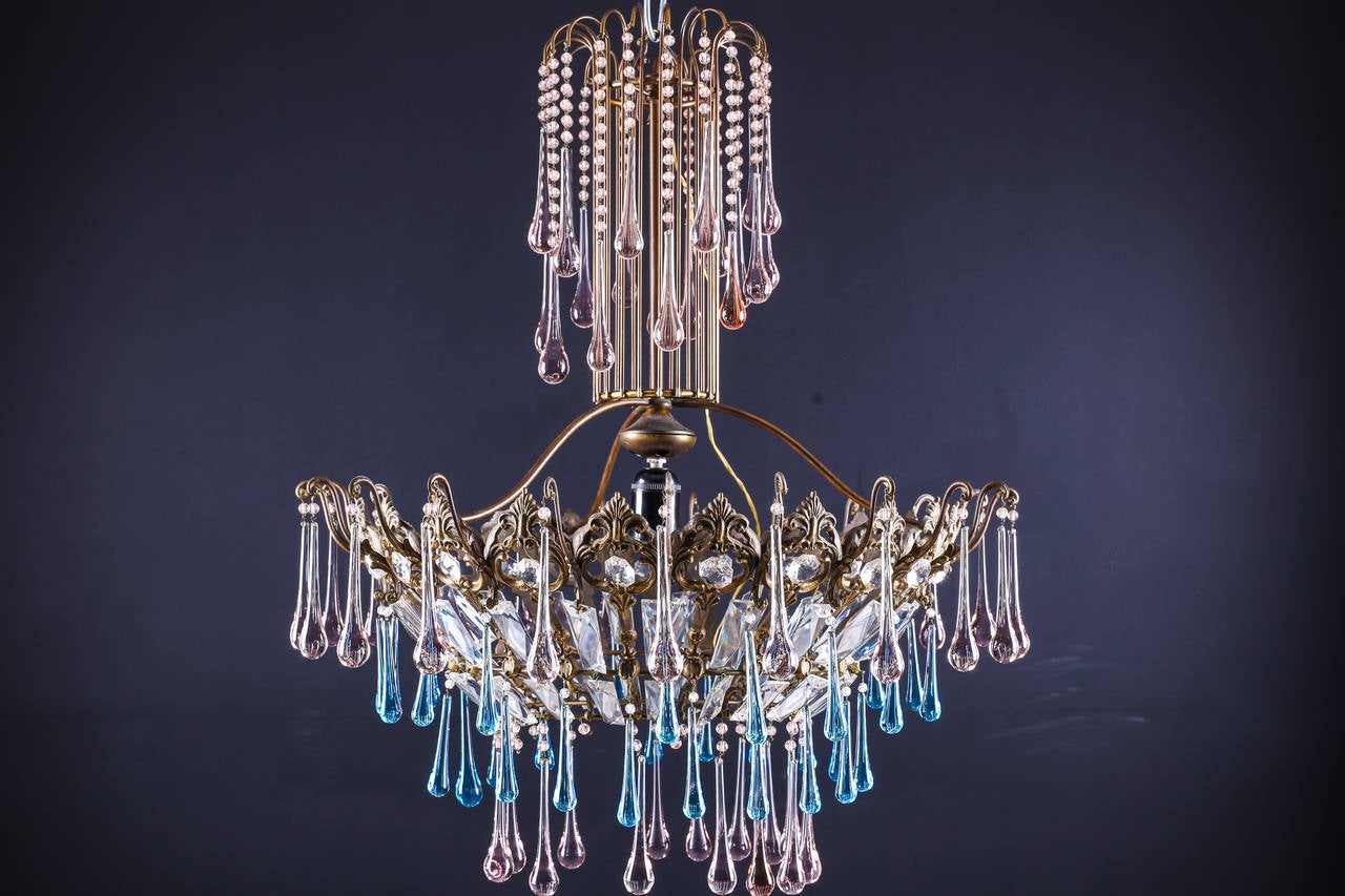 Vintage brass and crystal chandelier with Murano light pink and blue glass tear drops

Measure: Total height 27