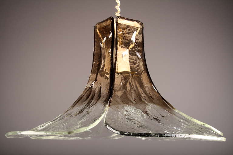 Beautiful Vintage 1970s Murano Glass Petal Form Chandelier by Carlo Nason for Mazzega, Italy. With four impeccable leaves of Tobacco & Light Green hand blown thick smooth textured Murano glass. The height is adjustable.