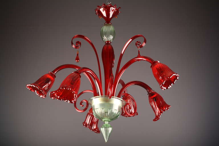 Vintage light green and red Murano glass chandelier

Total Height: 31