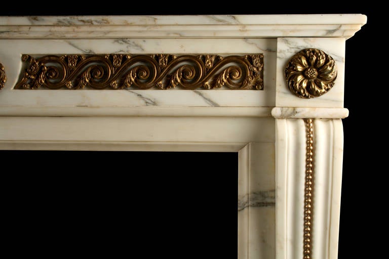 white veined marble french regency fireplace