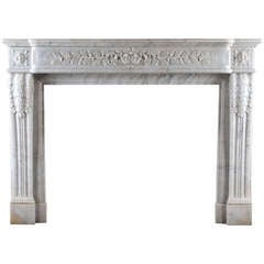 An Attractive French Louis XVI Antique Fireplace in White Carrara Marble