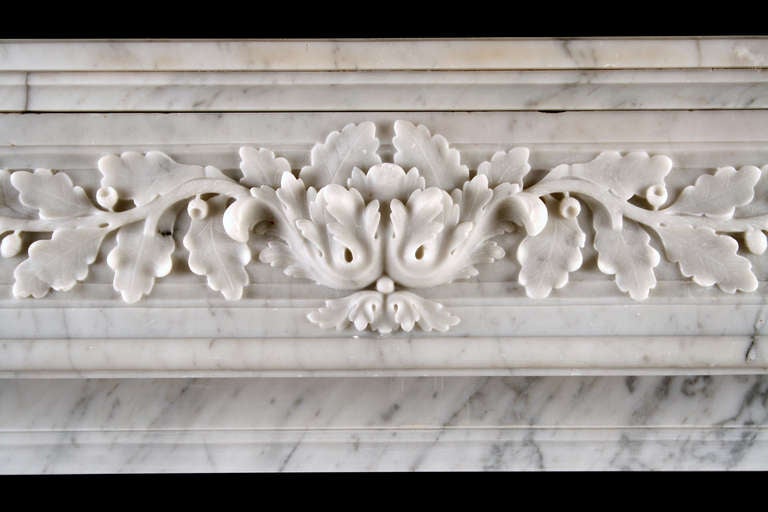 19th Century An Attractive French Louis XVI Antique Fireplace in White Carrara Marble