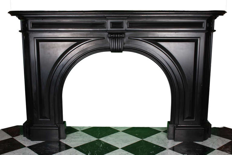 A large Antique arched chimney piece in very rare Belgium Black marble, late Regency George IV. English circa 1820.

Depth: 15.5