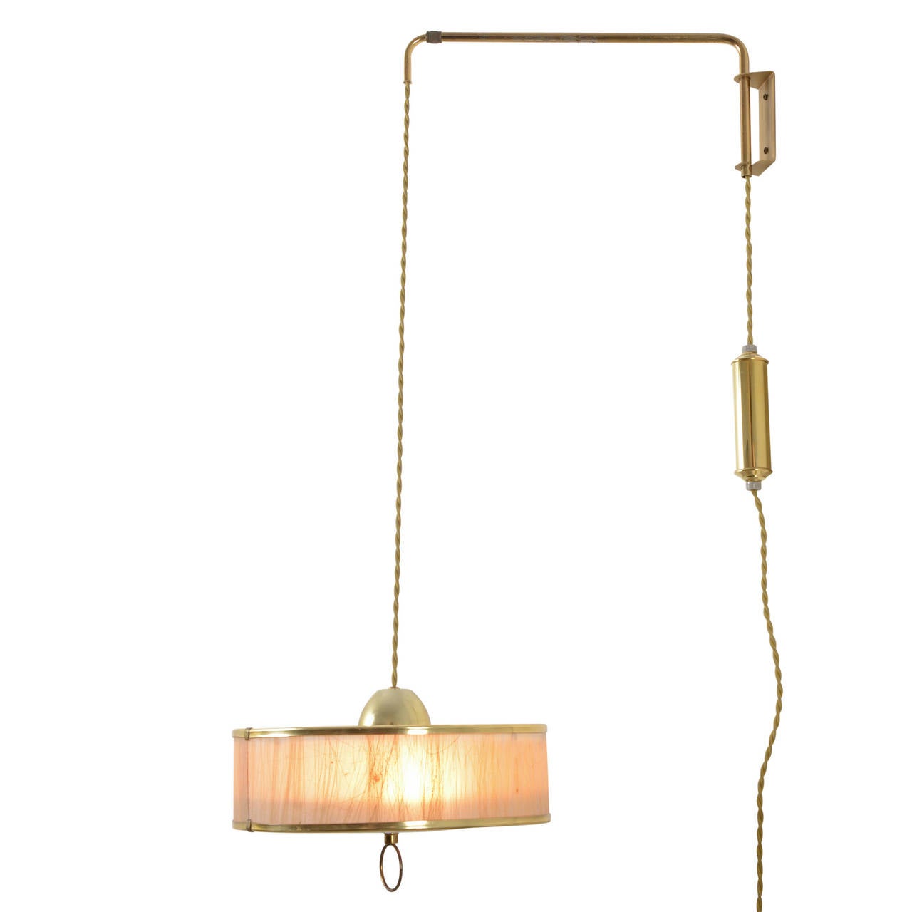 What's not to love about this engaging wall-mounted light? We're enamored by the versatility, which allows the lamp to move along both a vertical and horizontal axis. The swing arm moves the brass and mica-laden shade left and right, while the