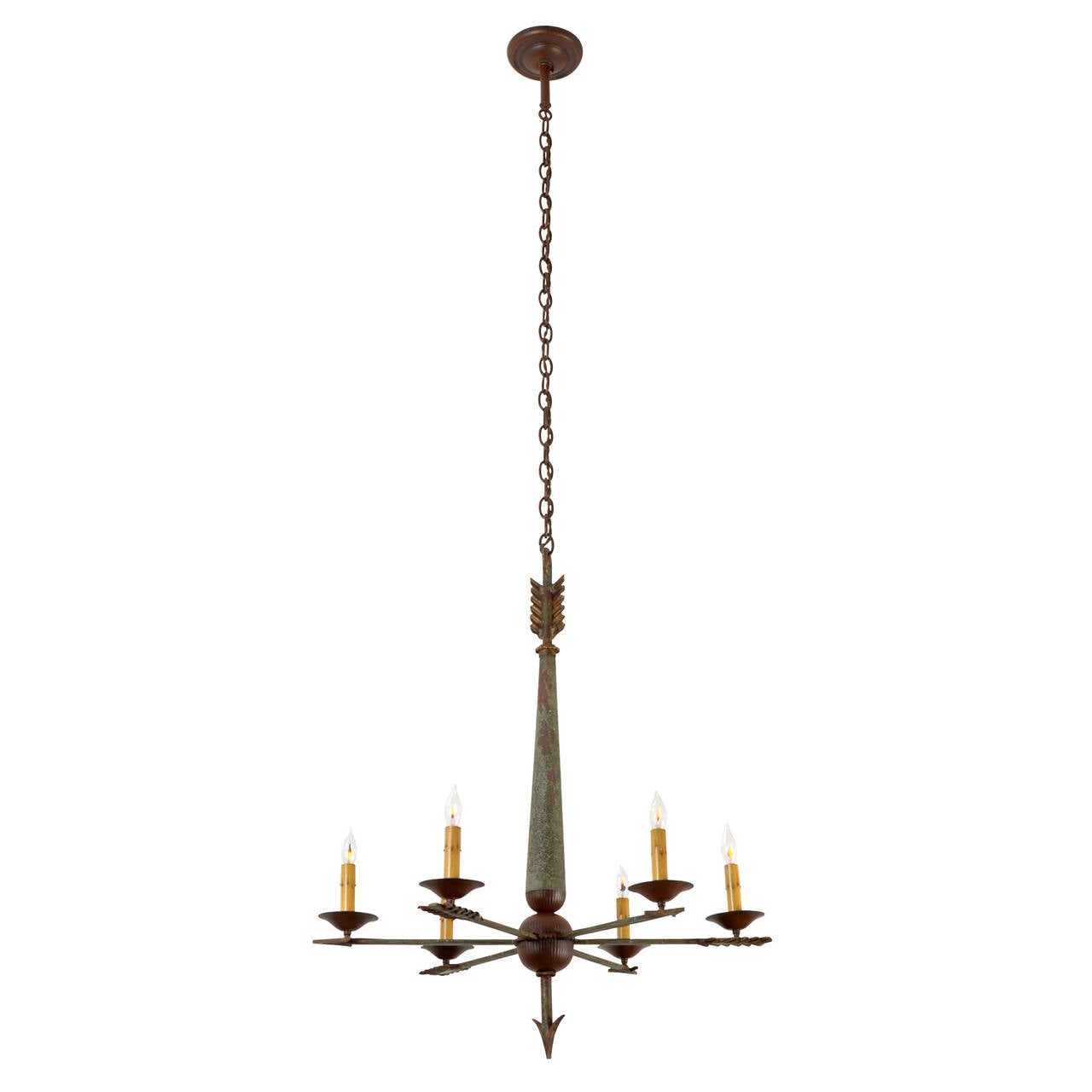 This remarkable 6-light chandelier is as mysterious as it is dramatic. While simple, thematic styling usually denotes a later date of manufacture, the hand-forged iron arrows and reeded cluster body suggest that this piece hails from earlier in the