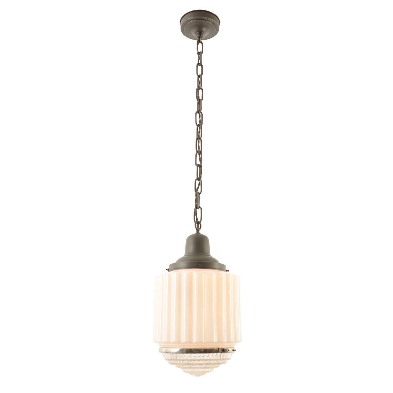 This classic Late Deco pendant features the popular combination white and clear shade common in many Depression-era stores and commercial settings. The clear pressed-glass lens on the bottom of the shade directed more direct rays downward while the