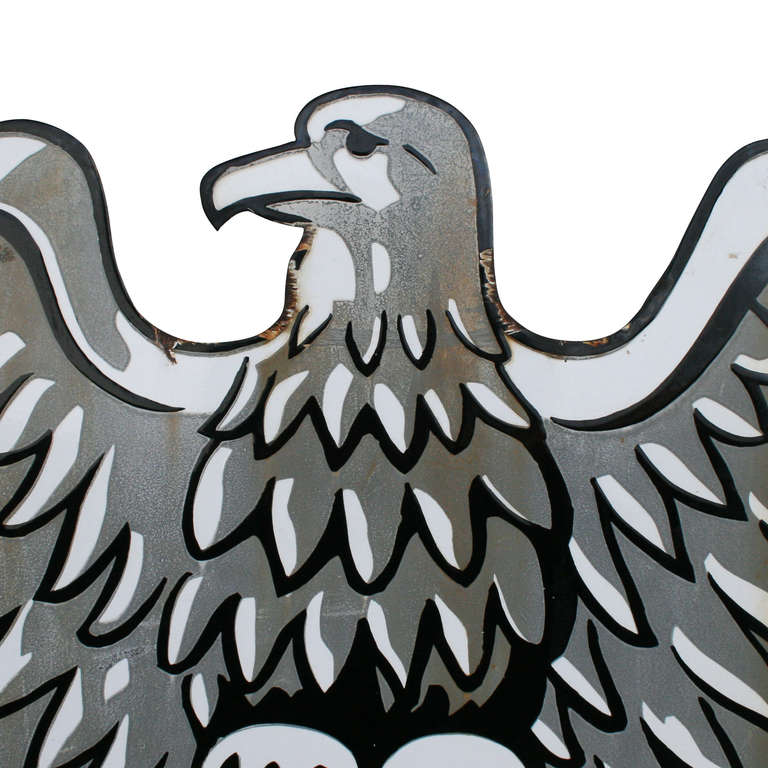 While we are unsure of what organization this eagle represents, we know what he stands for. Bold and stylized, this sign is exemplary of early to mid-20th century graphics and fonts. Measuring almost four feet tall, this is a serious piece of early