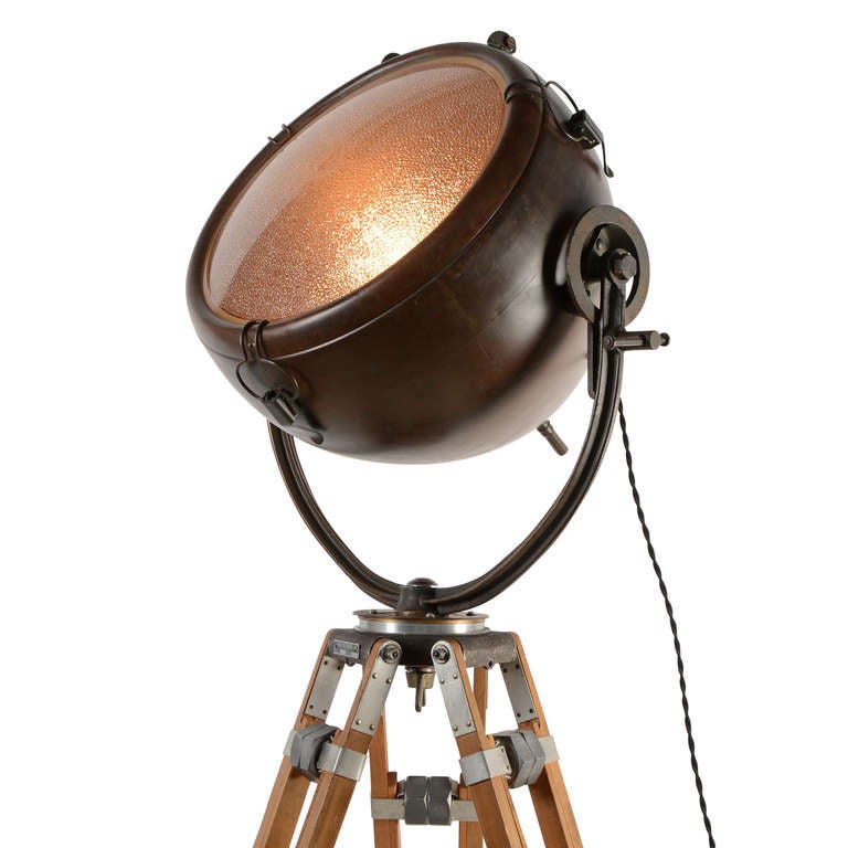 Who needs the Bat Signal when you've got this General Electric floodlight? Originally, this fixture would have graced the deck of a World War II-era naval ship. Today, we've completely restored it and combined it with a wood, steel and aluminum