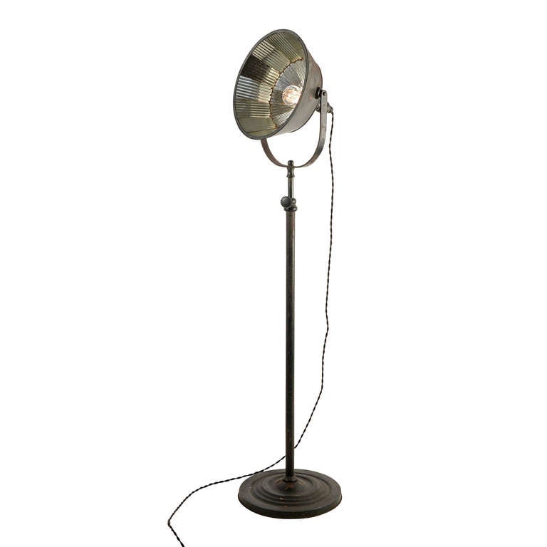 Once in a while a light comes along that defies all of our expectations of authenticity and rarity -- this is one of those lights. We present for your consideration this completely original I.P. Frink Industrial floor lamp. The only thing we've