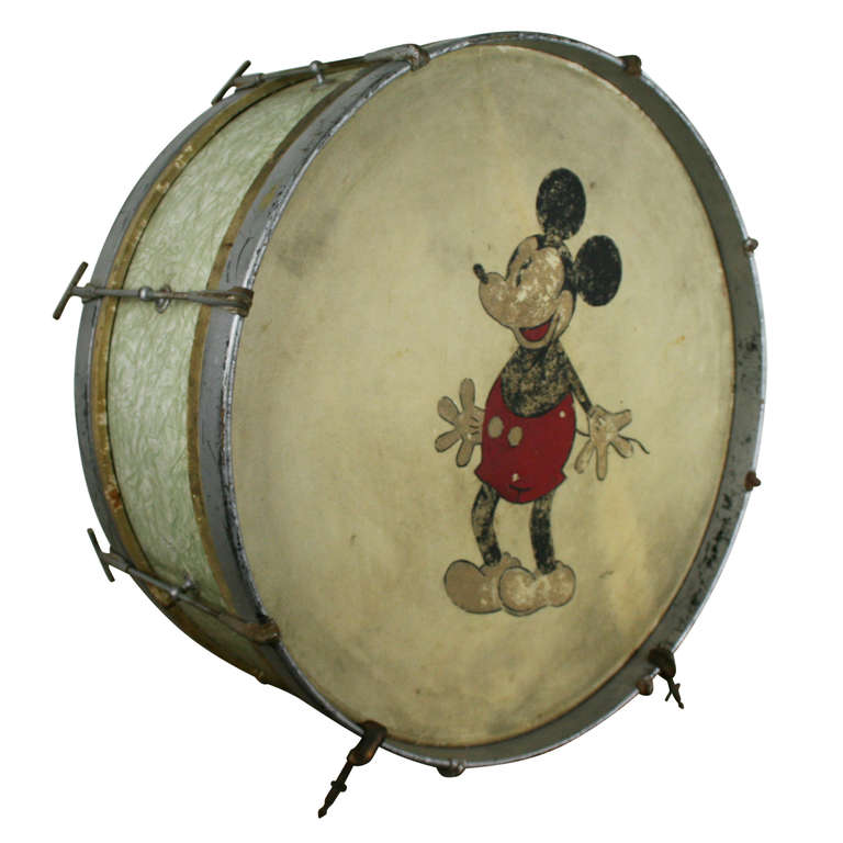 One of the most recognizable images in the world, this charmingly portrayed Mickey Mouse is familiar, even by the hand of the amateur artist responsible for this piece. Carefully rendered on the front of a kick drum, this vintage piece offers