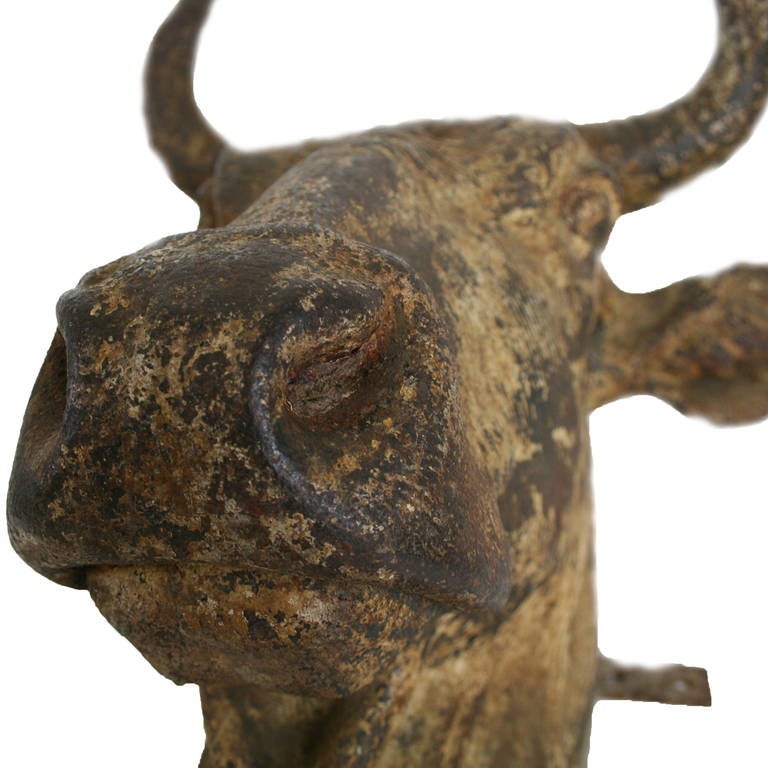 Salvaged from the front of a meat packing plant in Peoria, Illinois, this astonishing bull's head is an incredible relic from the hay-day of mid-western Industrial dominance. Weighing nearly 80 pounds, the iron allows for a very durable casting, but