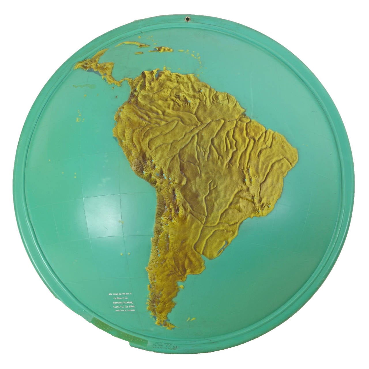 Produced by the American Printing House for the blind, this extremely rare set of educational relief half-spheres depicts five different sections of the world: Asia, Australia and surrounding islands, South America, the Arctic Gap and Africa. The