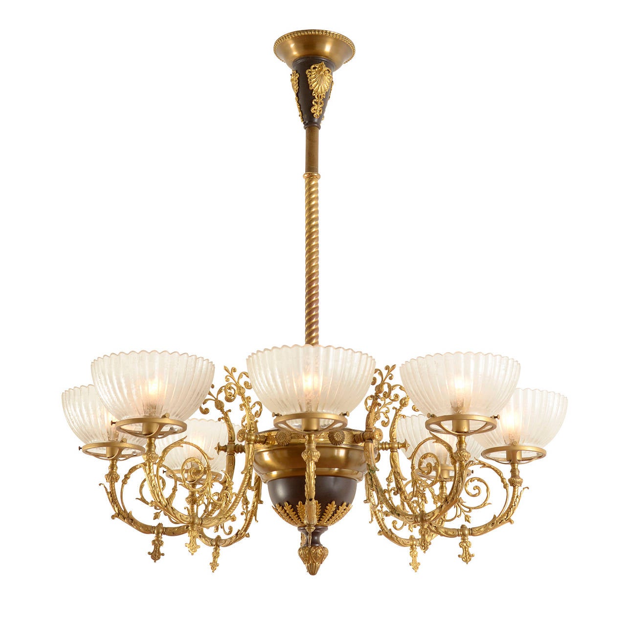 Distinguished by stylized acanthus leaves, exhuberant ornamentation and finely detailed castings, Beaux Arts-style lighting like this lovely 8-light  example captivated the market during the 1890s. Difficult and expensive to produce, they are hard
