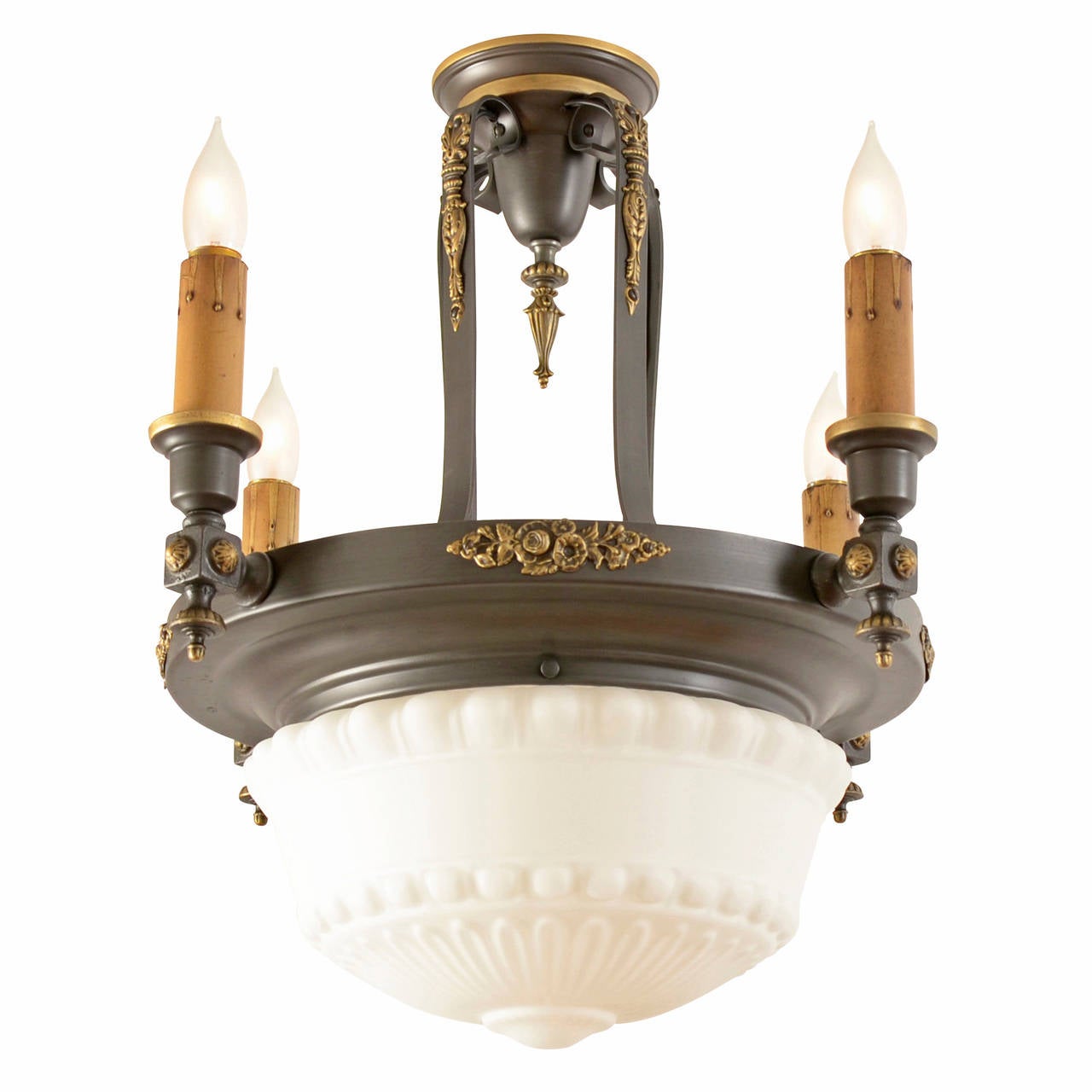 Combining the two hottest lighting trends of its time - bowl shades and multiple lights - this beautiful chandelier would have been a very special choice for bungalow, foursquare, or Colonial Revival dining rooms between 1915 and 1930. The most